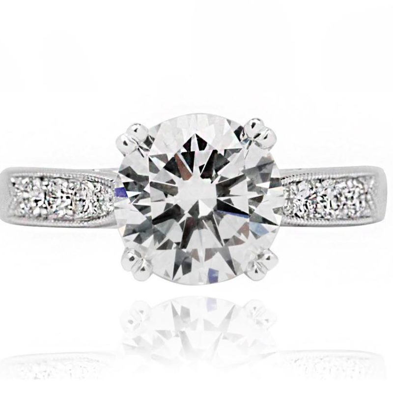 Round brilliant cut 18CT gold diamond engagement ring