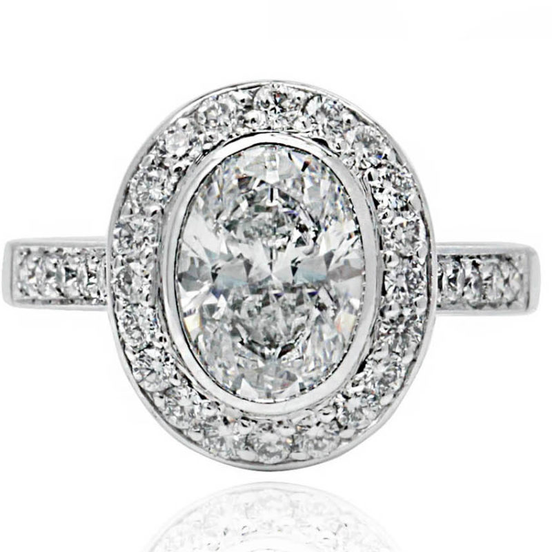 Alda white gold engagement ring halo.