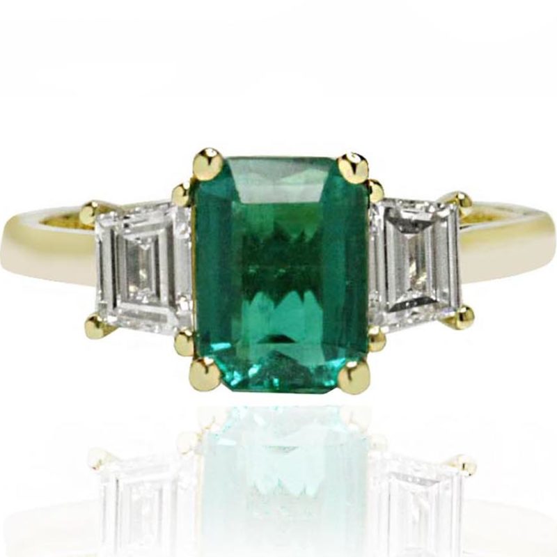 Emerald stone white gold diamond engagement ring