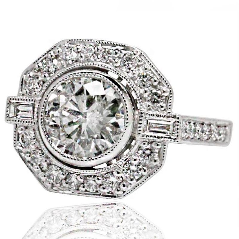 18ct White Gold Round Brilliant cut diamond halo engagement ring