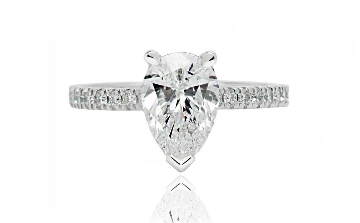 Pear shape white gold diamond engagement ring